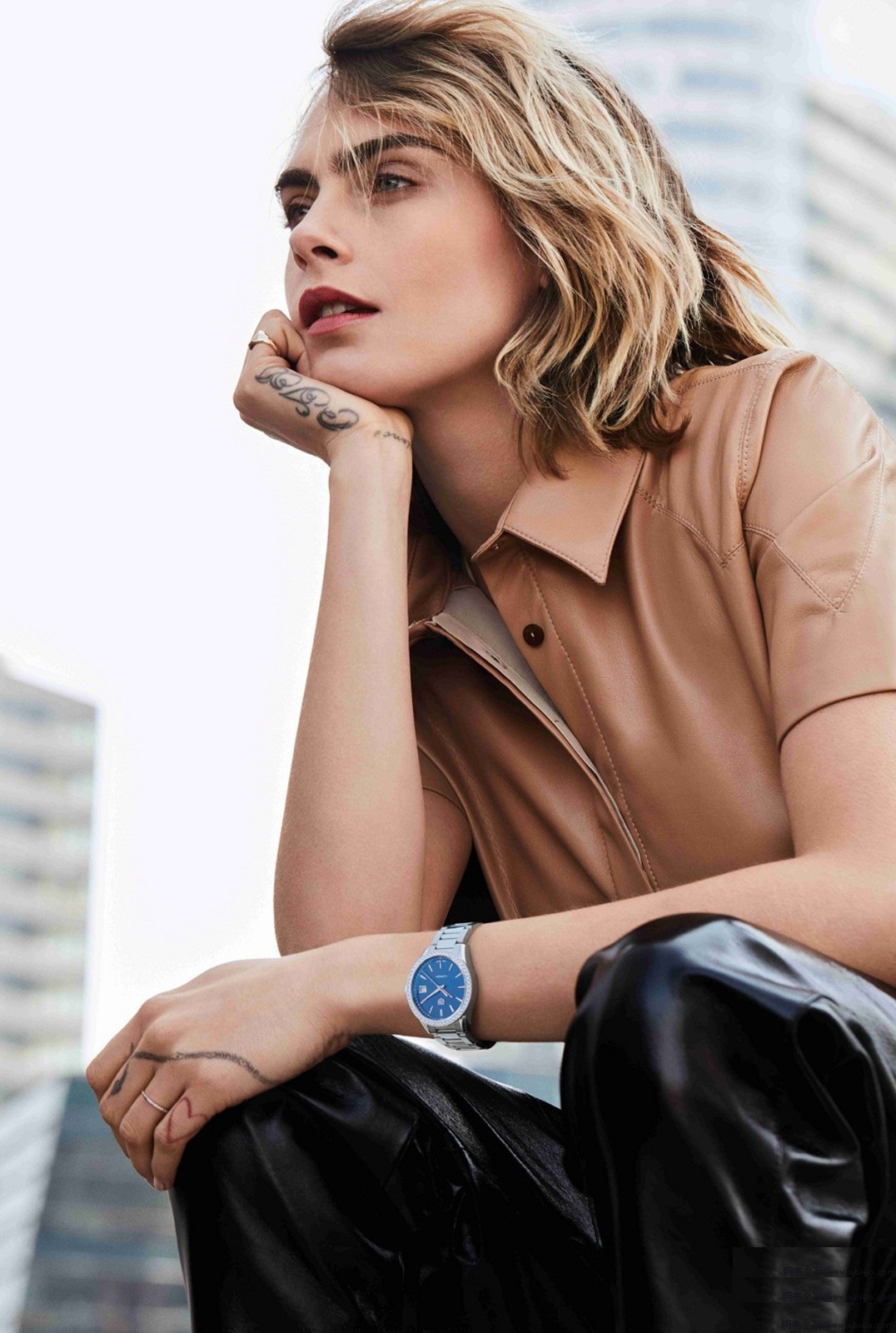 Cara Delevingne wears the blue dial fake TAG Heuer Carrera watch.